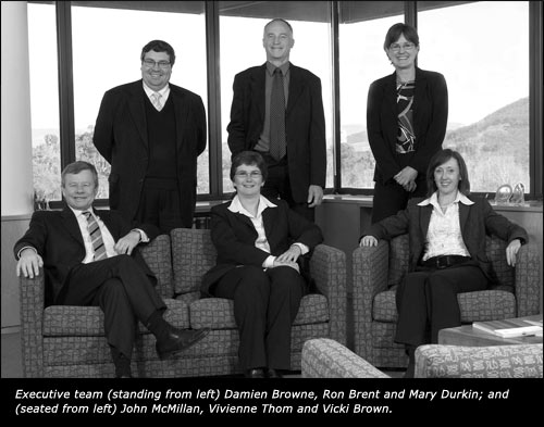 Executive team (standing from left) Damien Browne, Ron Brent and Mary Durkin; and (seated from left) John McMillan, Vivienne Thom and Vicki Brown.