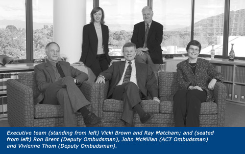 Executive team (standing from left) Vicki Brown and Ray Matcham; and (seated from left) Ron Brent (Deputy Ombudsman), John McMillan (ACT Ombudsman) and Vivienne Thom (Deputy Ombudsman).
